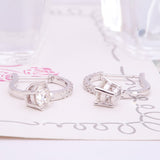 The Curly Light Moissanite Earrings