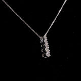 The Mellow Twirl Moissanite Necklace (14k Solid Gold)